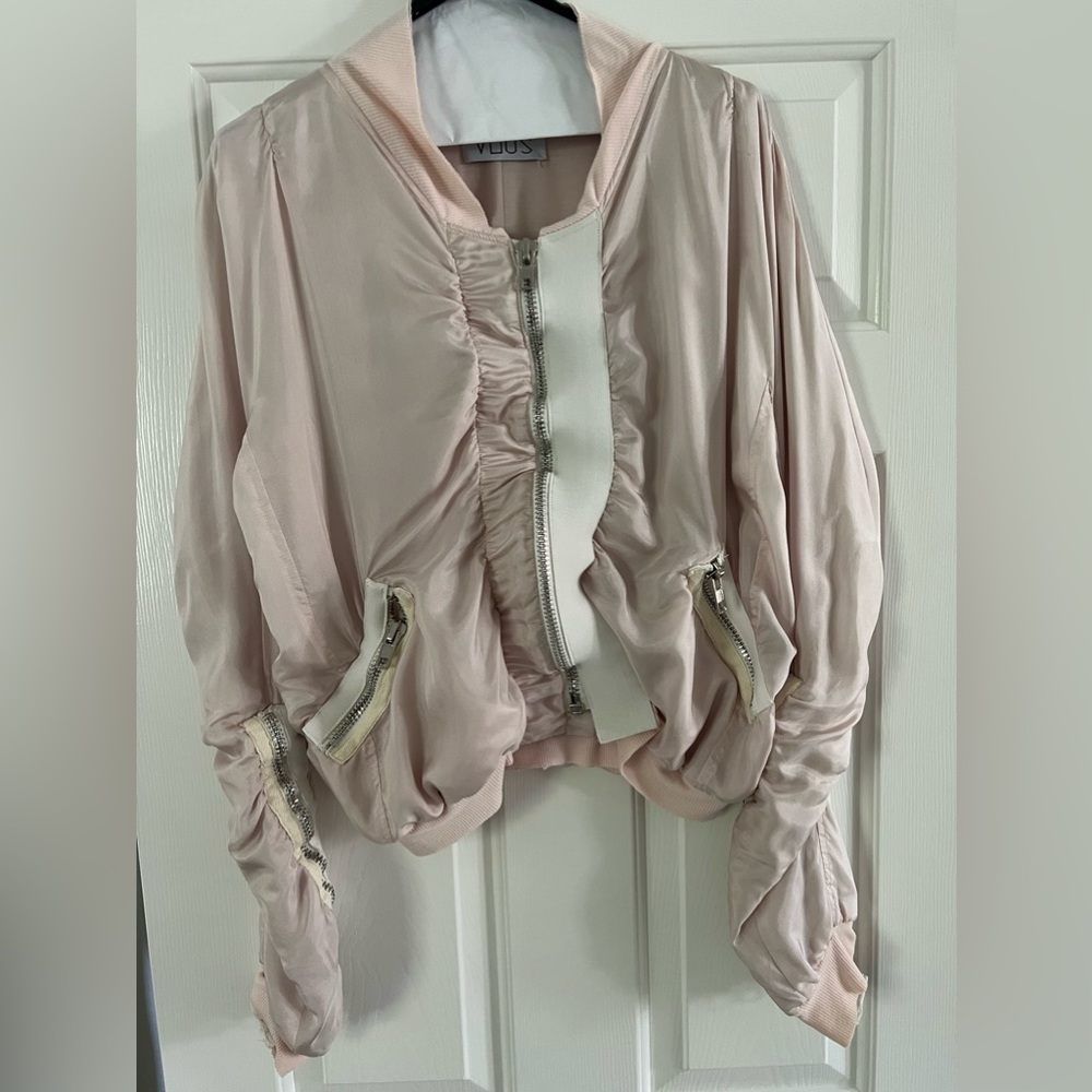 Baby pink jacket with zipper detailing. Worn Once. Size M